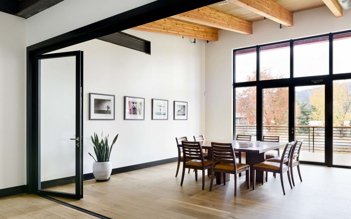 The conference room table with seating for a full group