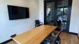 The display and desk, with the glass door out to the corridor