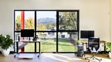 A dedicated desk beside the north-facing windows